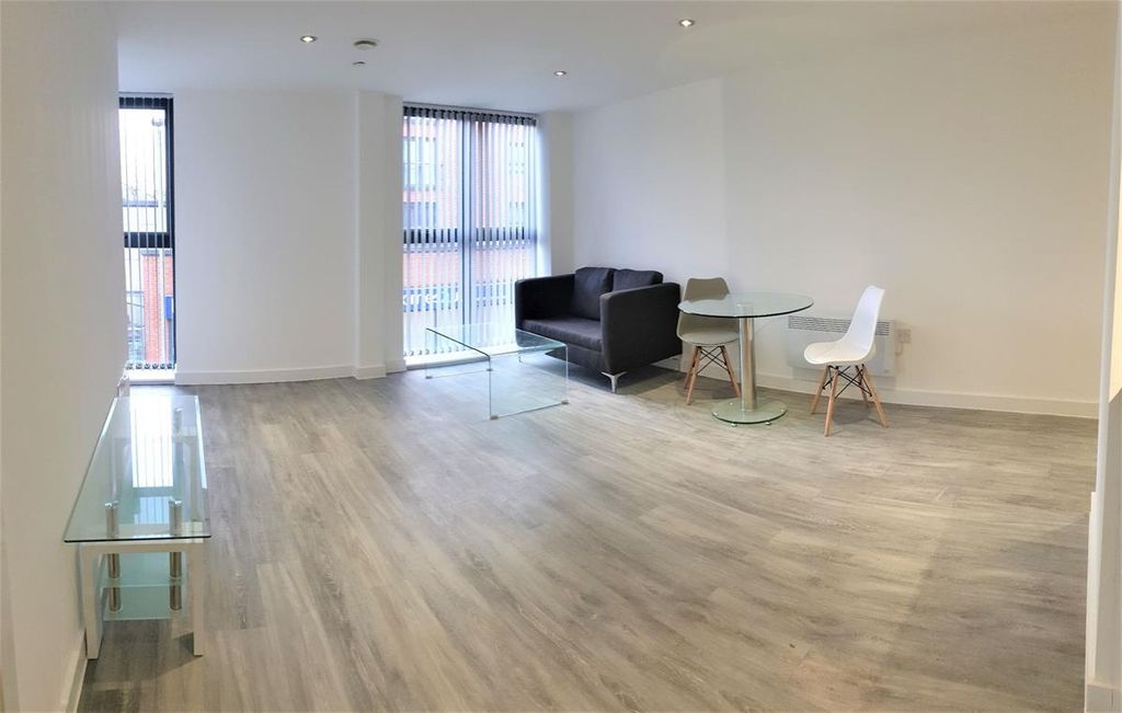 Property photo 2 of 7 Spacious Modern Lounge With Stylish Wood Floors...