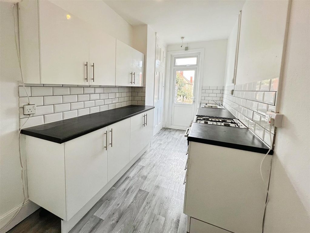 Property photo 3 of 13 Kitchen