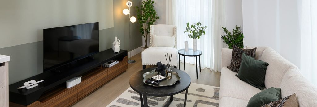 Property photo 1 of 5 Living Space With Modern Décor, White, Grey And Black Colour Palette