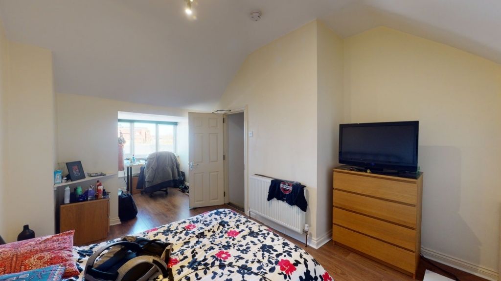 Property photo 1 of 7 Bright And Spacious Master Bedroom Featuring A Dou...