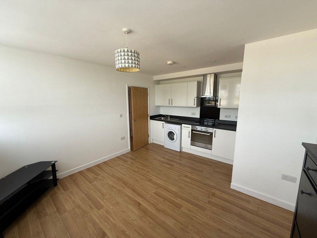 Property photo 2 of 6 Kitchen And Living Room