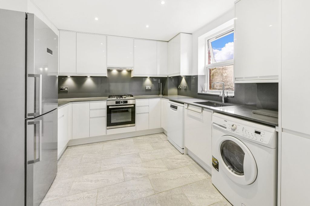 Property photo 3 of 12 Kitchen