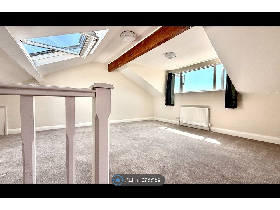 Property photo 3 of 8 Attic Bedroom
