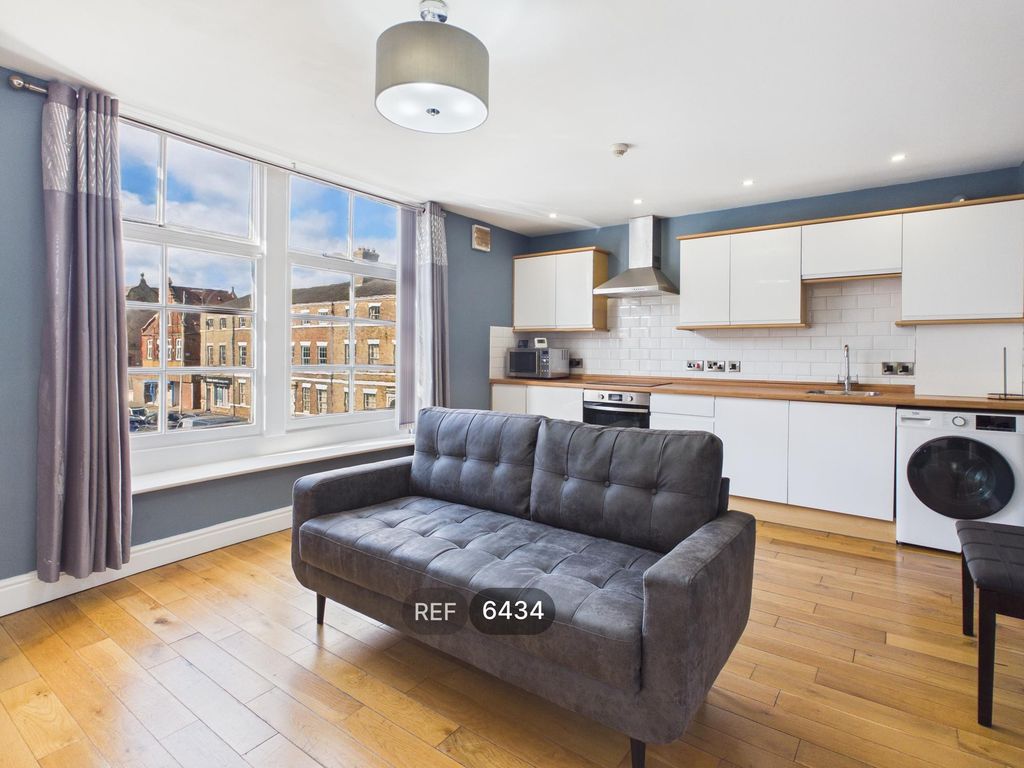 Property photo 3 of 14 Kitchen & Living Area