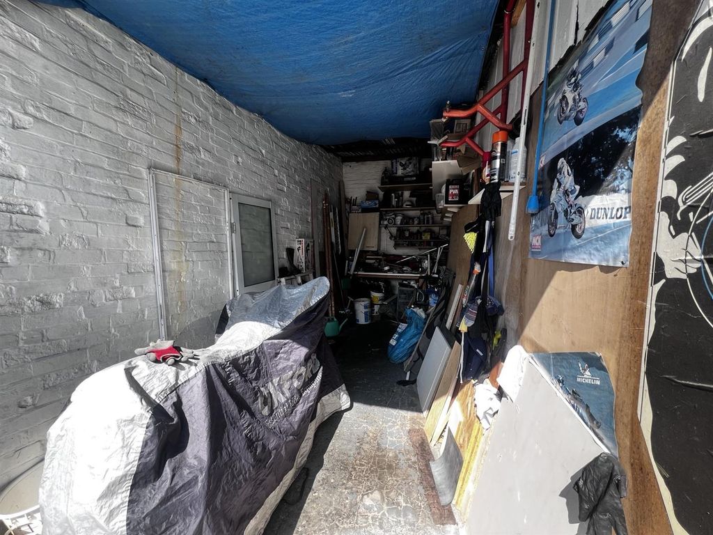 Property photo 2 of 3 Garage