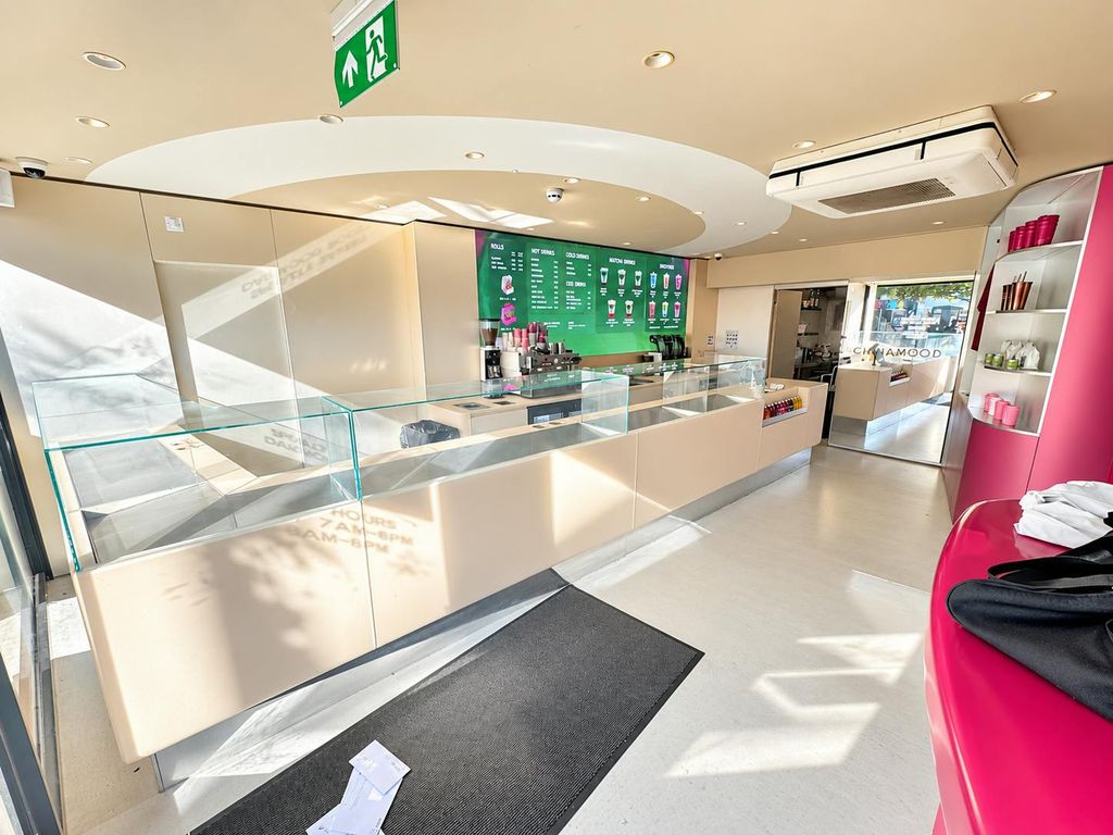 Property photo 2 of 8 Sunlit Modern Juice Bar Interior.Png