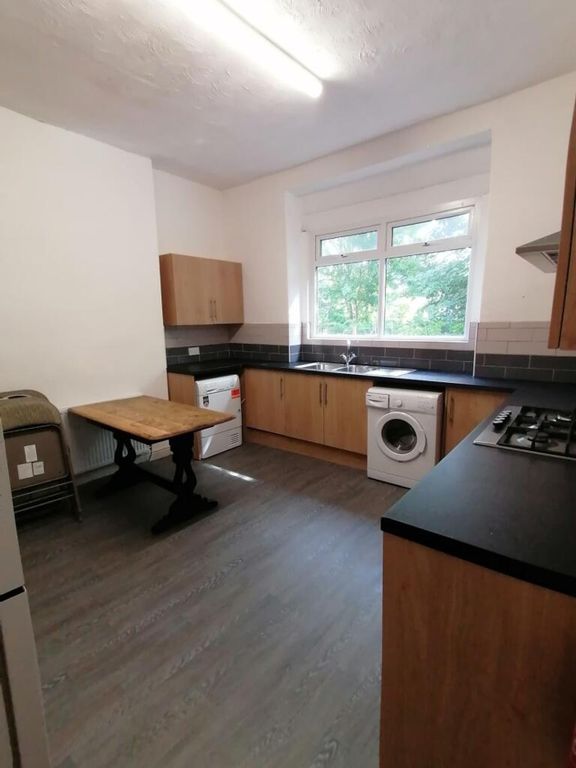 Property photo 3 of 9 Bright And Spacious Kitchen Featuring Modern Cabin...