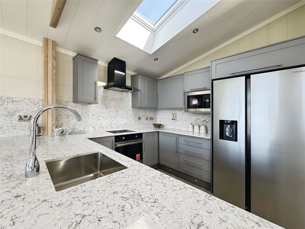 Property photo 3 of 12 Kitchen