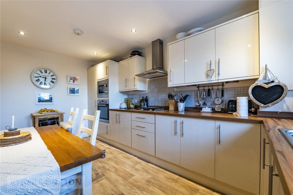Property photo 2 of 26 Dining Kitchen
