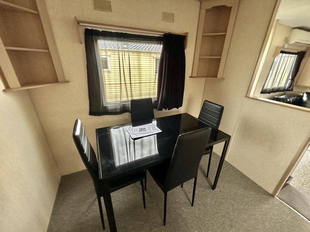 Property photo 3 of 12 Dining Room