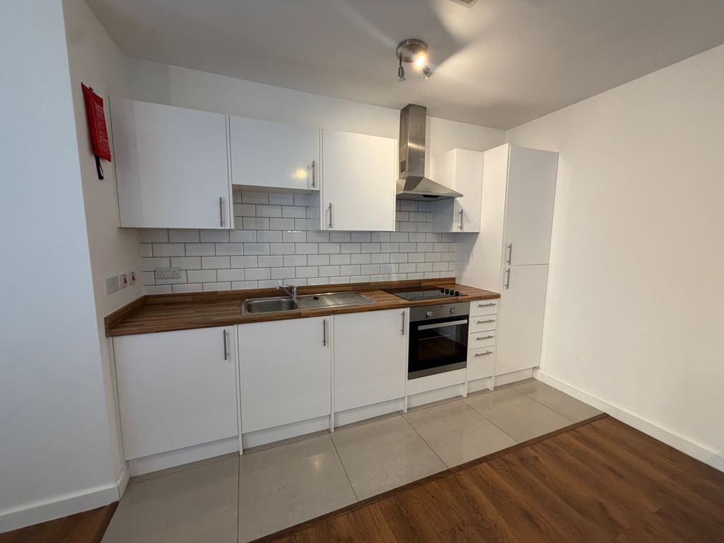 Property photo 2 of 8 Kitchen