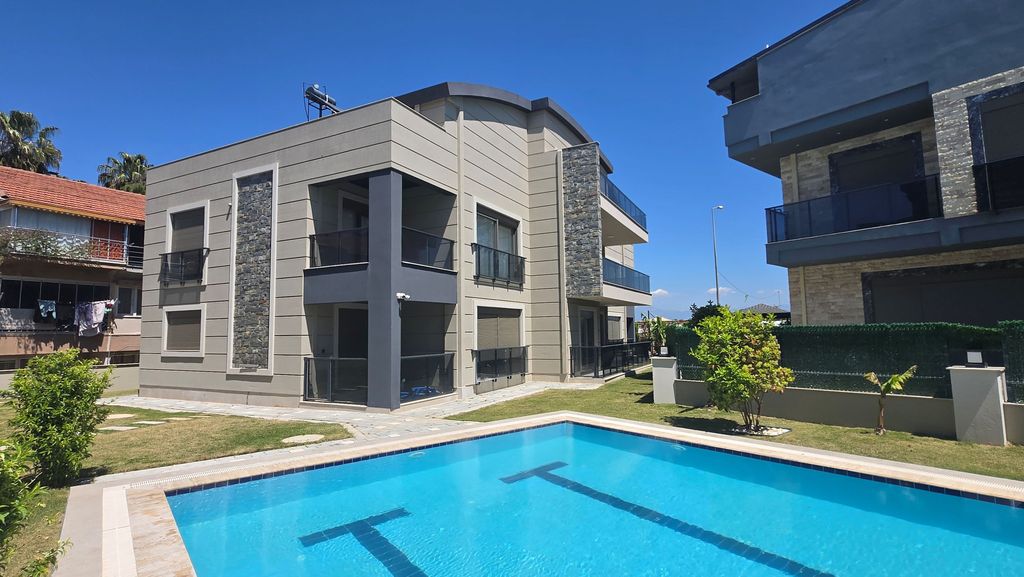 Property photo 1 of 17 Appealing Belek Apartment In Antalya For Sale - Apartment Building And Communal Pool
