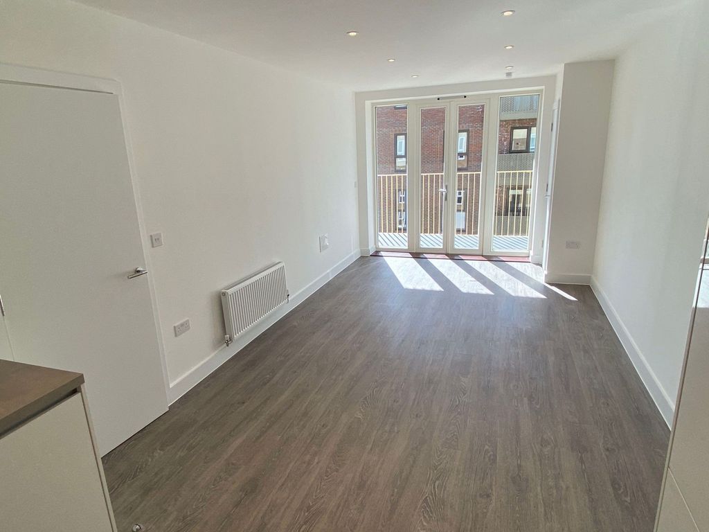 Property photo 3 of 12 Front Room