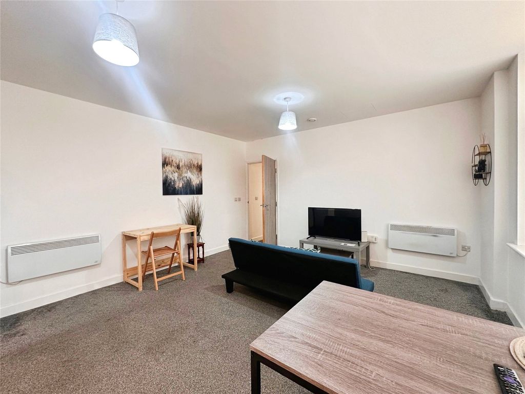 Property photo 3 of 7 Living Area