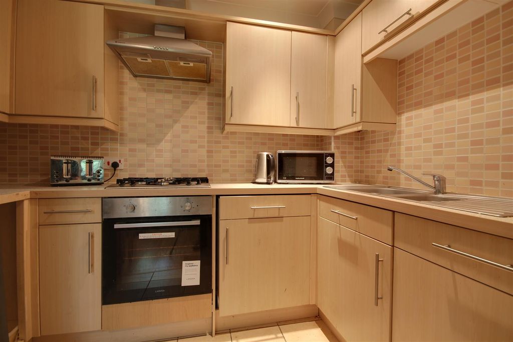 Property photo 3 of 6 Kitchen Area