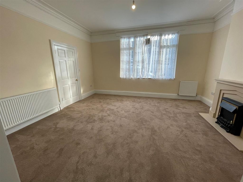 Property photo 3 of 21 Living Area