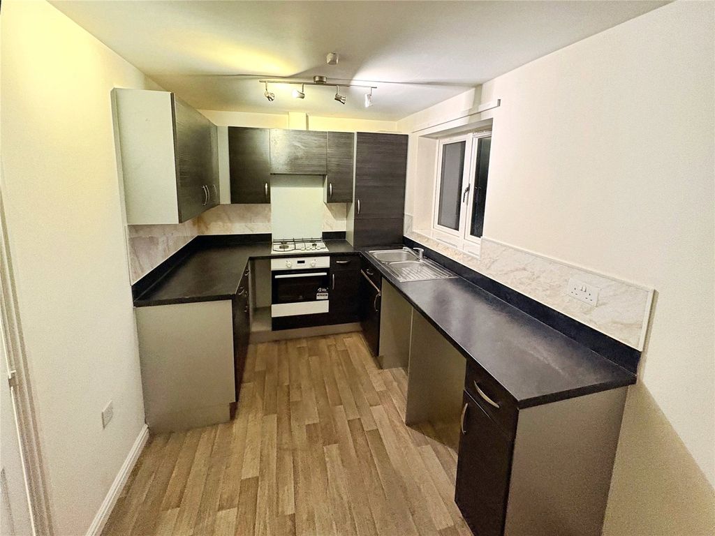 Property photo 2 of 11 Dining Kitchen