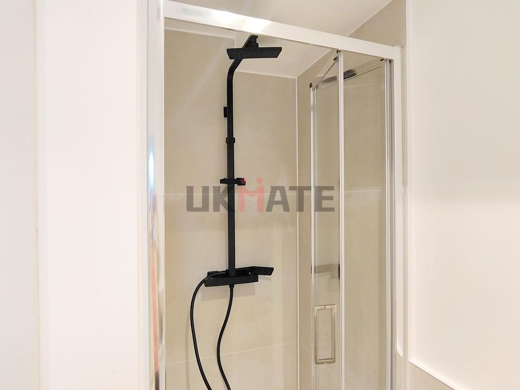 Property photo 2 of 7 Modern Bathroom With A Large Shower Cubicle Featur...