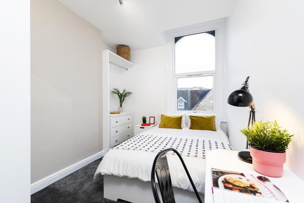 Property photo 3 of 9 Bright And Airy Master Bedroom Featuring A Comfort...