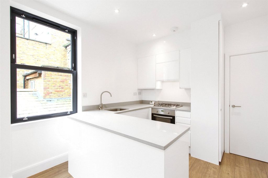 Property photo 3 of 10 Kitchen