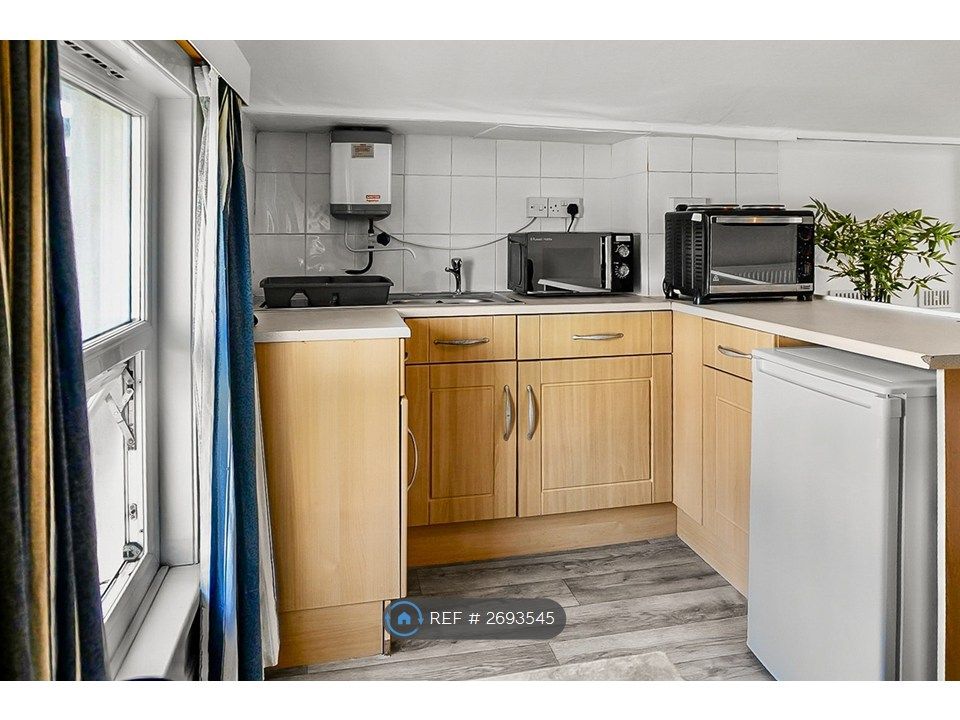 Property photo 3 of 4 Kitchen Area