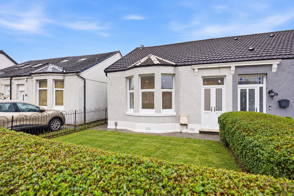 Property photo 1 of 18 Tidy Grey Bungalow With Trimmed Hedges.Png