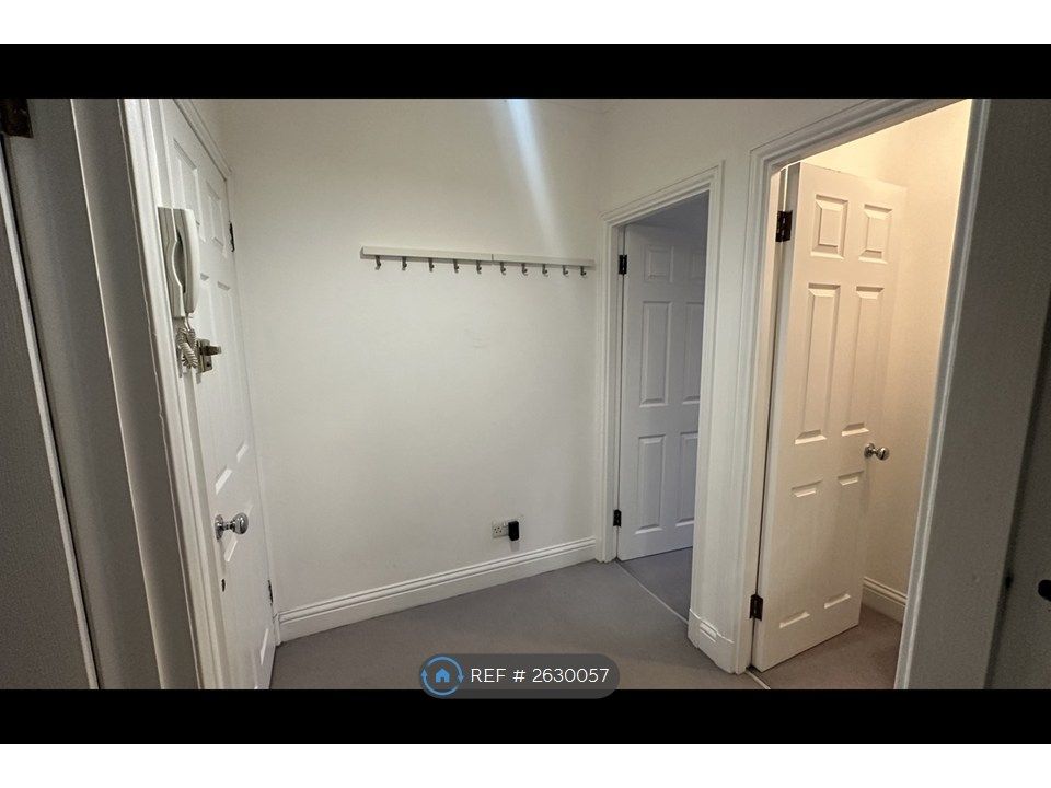 Property photo 2 of 21 Behind Front Door/Entrance