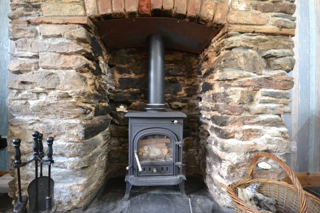 Property photo 3 of 11 Lounge Fireplace