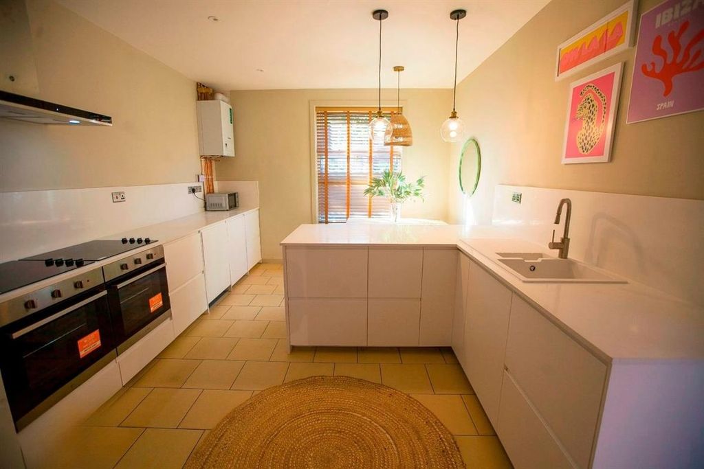 Property photo 2 of 10 Bright Modern Kitchen With Island And Pendanting...