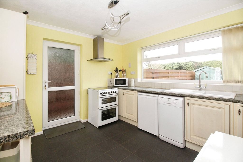 Property photo 3 of 13 Kitchen