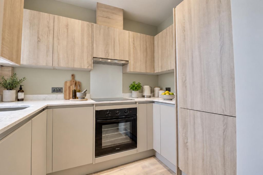 Property photo 3 of 16 Scandinavian Sage Kitchen In Daylight.Png