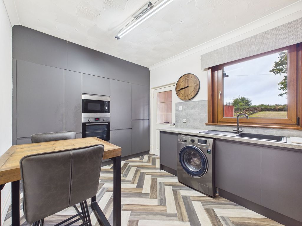 Property photo 3 of 12 Kitchen