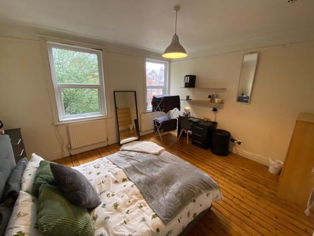 Property photo 2 of 27 A Bright And Inviting Master Bedroom Featuring A l...