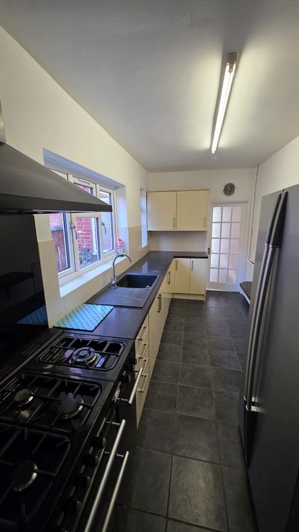 Property photo 3 of 13 Kitchen