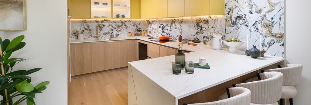 Property photo 2 of 4 Kitchen With Attached Island, Marble Pattern Splashback Tiles, White Counters