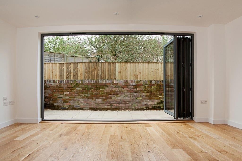 Property photo 3 of 6 Bright Living Room With Stunning Bi-Fold Doors...