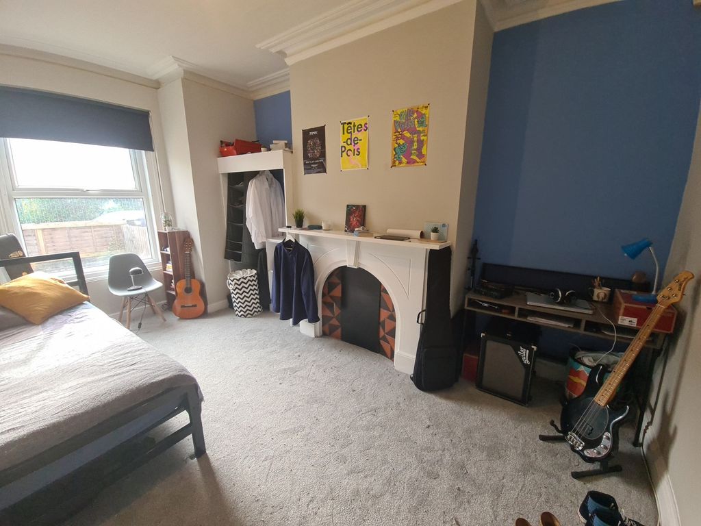 Property photo 1 of 9 A Spacious And Inviting Master Bedroom Featuring A...