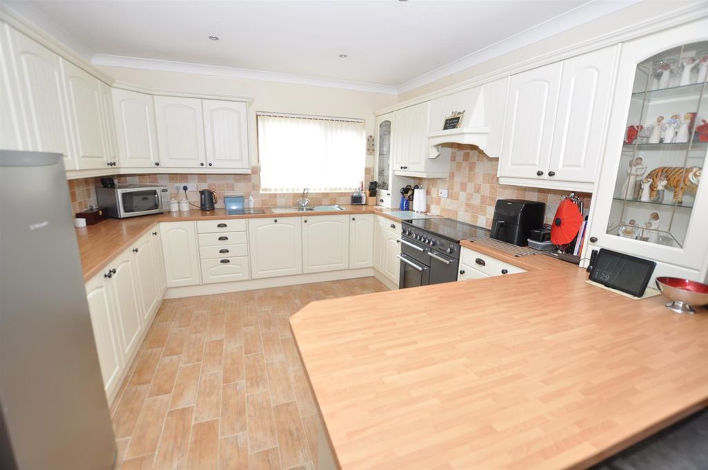 Property photo 3 of 21 Kitchen/Dining/Family Room