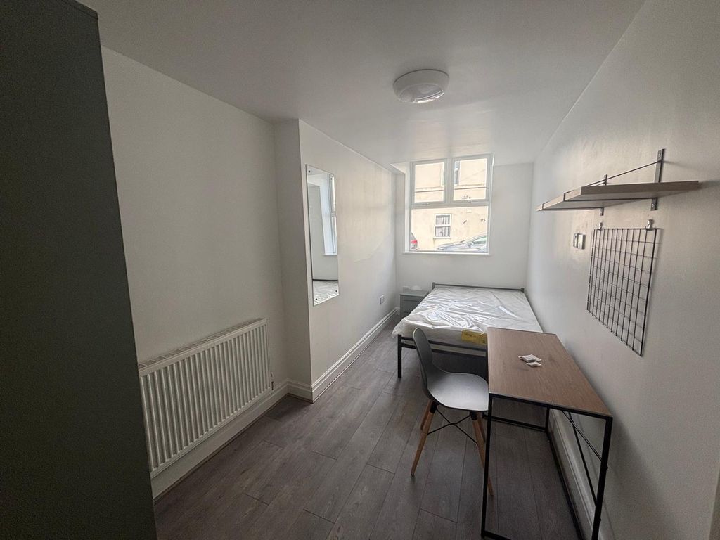 Property photo 3 of 9 This Cozy Double Bedroom Features Ample Natural li...