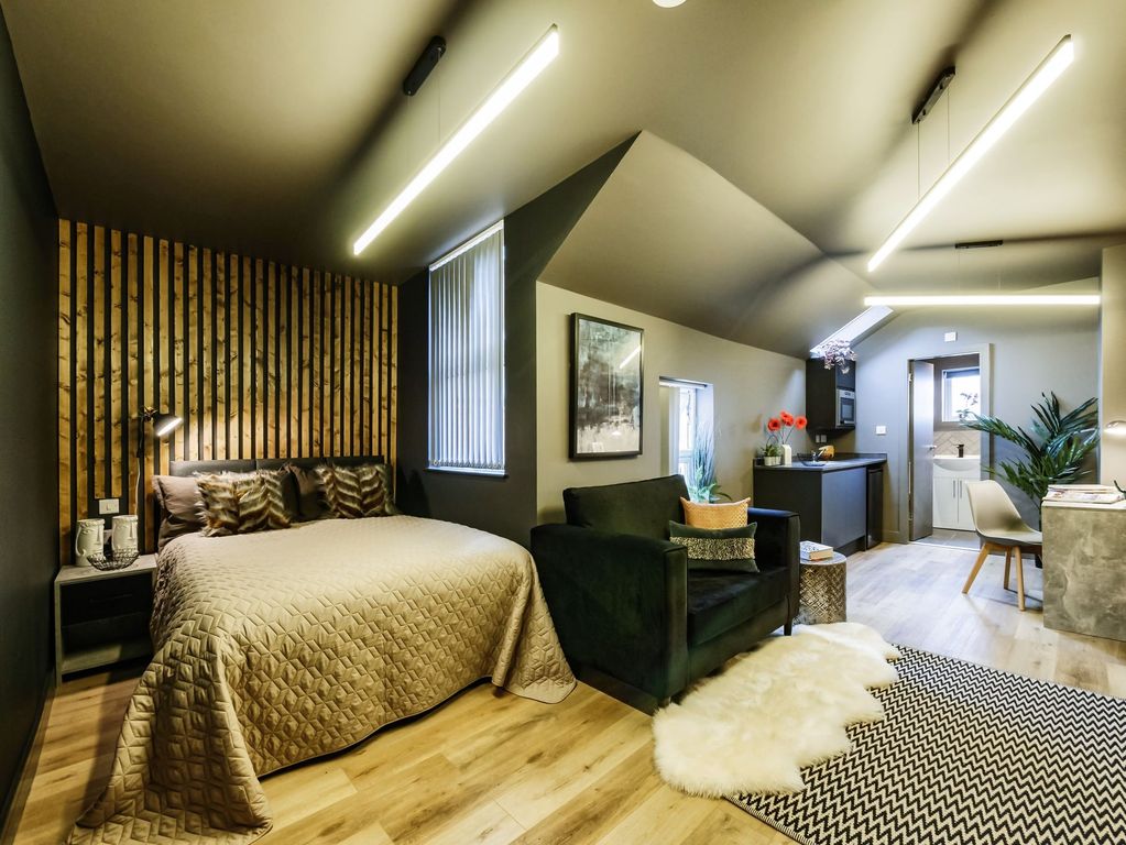 Property photo 1 of 14 A Stylish And Spacious Master Bedroom Featuring A ...