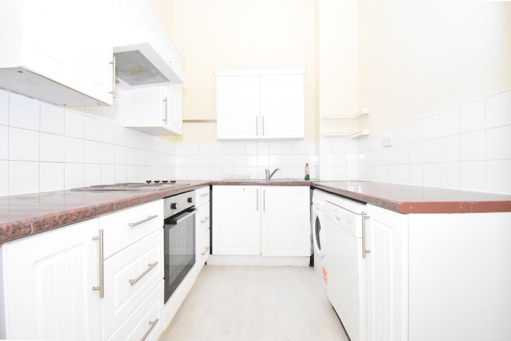 Property photo 3 of 8 Kitchen