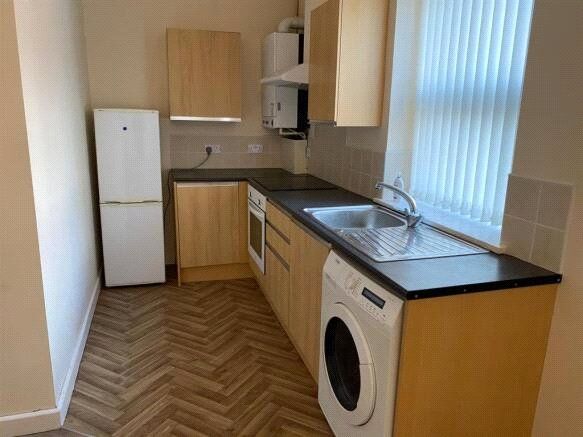 Property photo 2 of 7 Kitchen