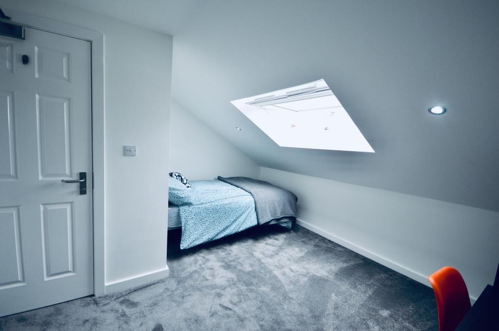 Property photo 3 of 14 A Bright And Airy Master Bedroom Featuring A Comfo...