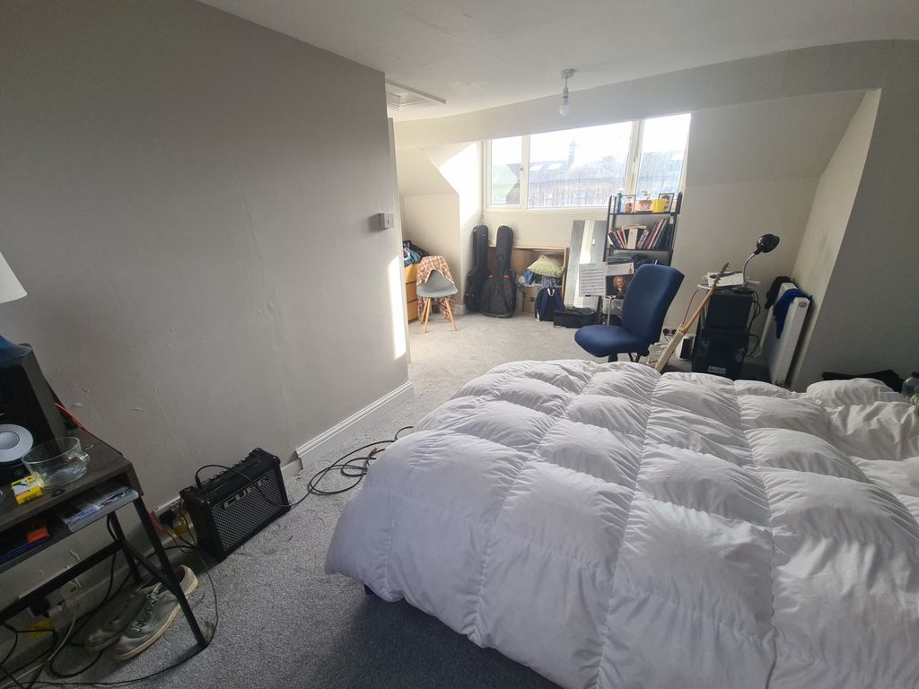 Property photo 2 of 9 Bright And Spacious Master Bedroom Featuring A Com...
