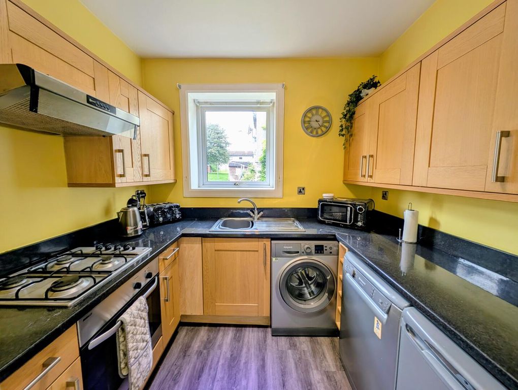Property photo 3 of 7 Kitchen