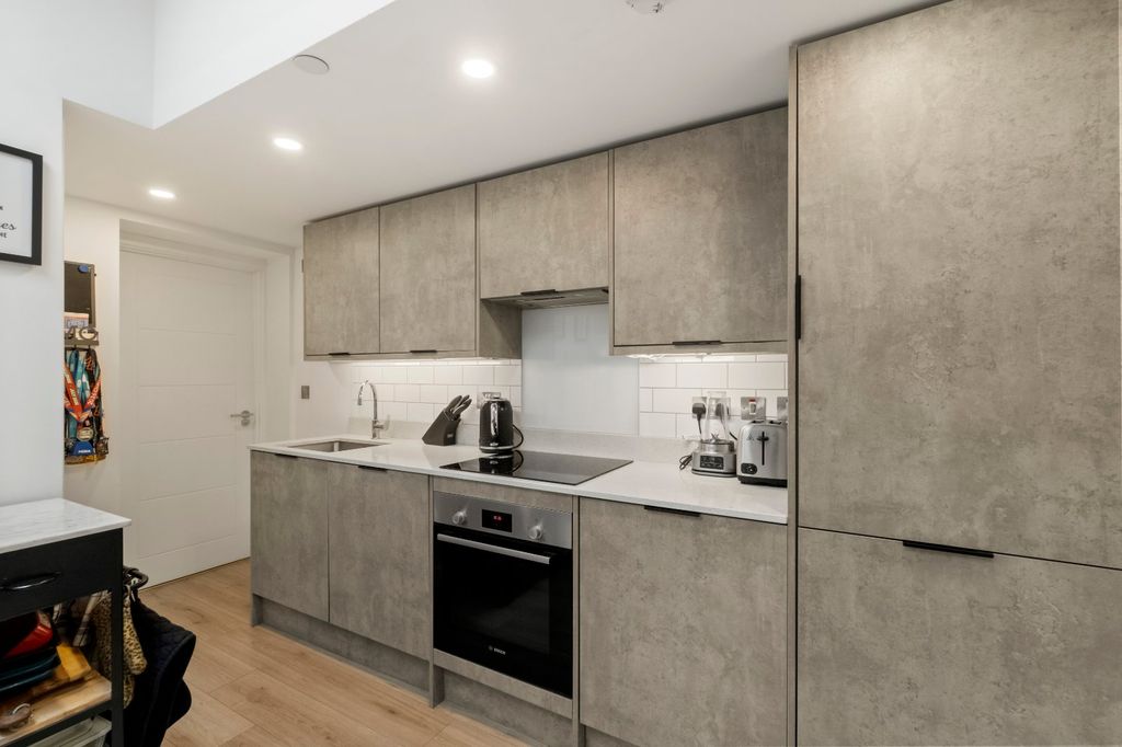 Property photo 3 of 12 Kitchen