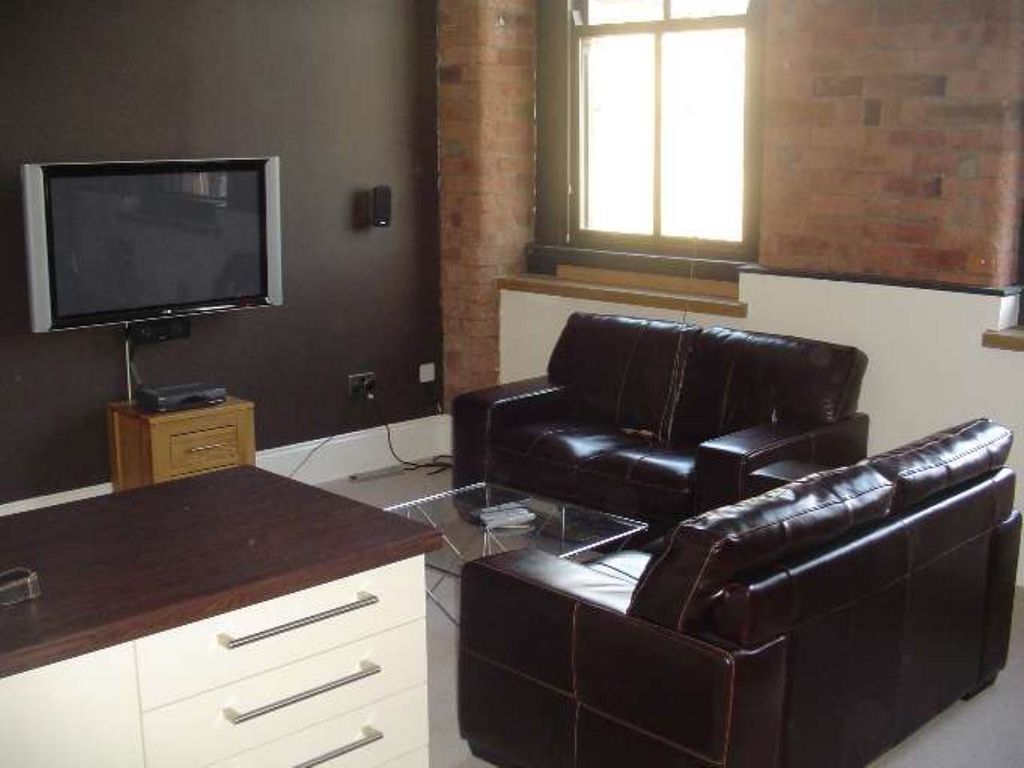 Property photo 2 of 6 Living Area