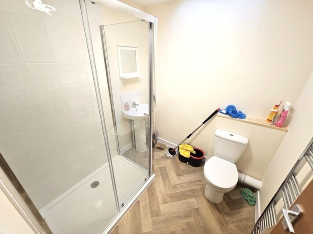 Property photo 3 of 5 Bright And Clean Bathroom Featuring A Modern Walk-...