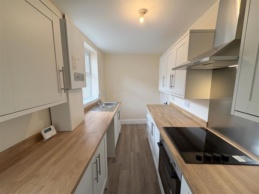 Property photo 1 of 12 Kitchen