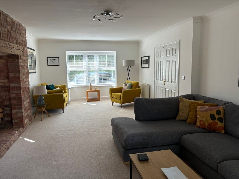 Property photo 3 of 8 Living Room